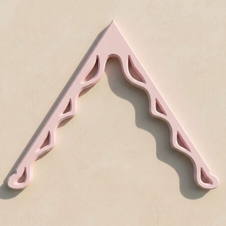 Accoya wood bargeboards with decorative cutouts, painted pink, for exterior roofline accents.